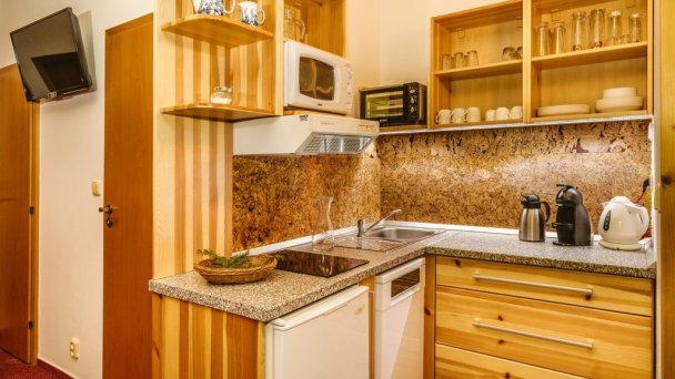 Kuchyňa s kávovarom a umývačkou v každom apartmáne